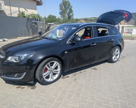 Черный Опель Инсигния, объемом двигателя 2 л и пробегом 290 тыс. км за 10905 $, фото 1 на Automoto.ua