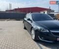 Черный Опель Инсигния, объемом двигателя 1.6 л и пробегом 250 тыс. км за 9000 $, фото 1 на Automoto.ua