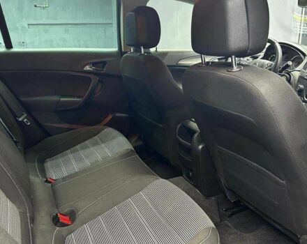 Черный Опель Инсигния, объемом двигателя 2 л и пробегом 324 тыс. км за 10800 $, фото 13 на Automoto.ua