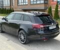 Чорний Опель Інсігнія, об'ємом двигуна 1.96 л та пробігом 238 тис. км за 11500 $, фото 5 на Automoto.ua