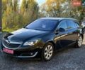 Чорний Опель Інсігнія, об'ємом двигуна 1.6 л та пробігом 144 тис. км за 10900 $, фото 2 на Automoto.ua