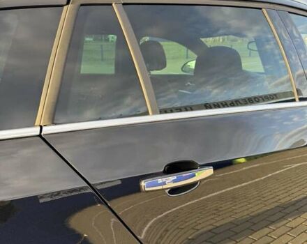 Черный Опель Инсигния, объемом двигателя 2 л и пробегом 160 тыс. км за 11900 $, фото 2 на Automoto.ua