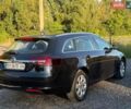 Чорний Опель Інсігнія, об'ємом двигуна 1.6 л та пробігом 192 тис. км за 11000 $, фото 5 на Automoto.ua
