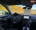 Чорний Опель Інсігнія, об'ємом двигуна 1.6 л та пробігом 144 тис. км за 10900 $, фото 27 на Automoto.ua