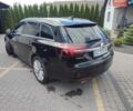 Чорний Опель Інсігнія, об'ємом двигуна 2 л та пробігом 166 тис. км за 12500 $, фото 1 на Automoto.ua