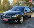Чорний Опель Інсігнія, об'ємом двигуна 1.6 л та пробігом 144 тис. км за 10900 $, фото 1 на Automoto.ua