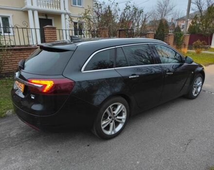 Чорний Опель Інсігнія, об'ємом двигуна 2 л та пробігом 255 тис. км за 10999 $, фото 7 на Automoto.ua