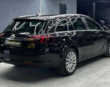 Черный Опель Инсигния, объемом двигателя 2 л и пробегом 324 тыс. км за 10800 $, фото 5 на Automoto.ua