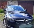 Черный Опель Инсигния, объемом двигателя 2 л и пробегом 105 тыс. км за 13500 $, фото 1 на Automoto.ua