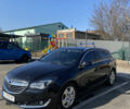 Черный Опель Инсигния, объемом двигателя 1.96 л и пробегом 220 тыс. км за 11999 $, фото 2 на Automoto.ua