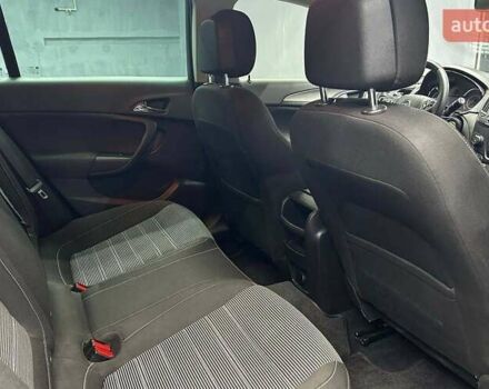 Чорний Опель Інсігнія, об'ємом двигуна 1.96 л та пробігом 324 тис. км за 10800 $, фото 13 на Automoto.ua