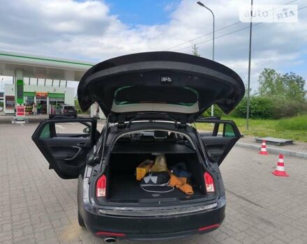 Чорний Опель Інсігнія, об'ємом двигуна 1.96 л та пробігом 290 тис. км за 10900 $, фото 16 на Automoto.ua