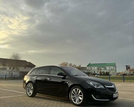 Черный Опель Инсигния, объемом двигателя 2 л и пробегом 160 тыс. км за 11900 $, фото 1 на Automoto.ua