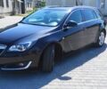 Чорний Опель Інсігнія, об'ємом двигуна 2 л та пробігом 251 тис. км за 11200 $, фото 3 на Automoto.ua