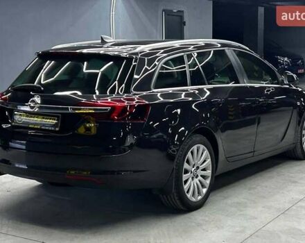 Чорний Опель Інсігнія, об'ємом двигуна 1.96 л та пробігом 324 тис. км за 10800 $, фото 5 на Automoto.ua