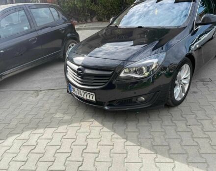 Черный Опель Инсигния, объемом двигателя 2 л и пробегом 219 тыс. км за 6386 $, фото 2 на Automoto.ua
