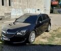 Черный Опель Инсигния, объемом двигателя 1.6 л и пробегом 154 тыс. км за 12300 $, фото 2 на Automoto.ua