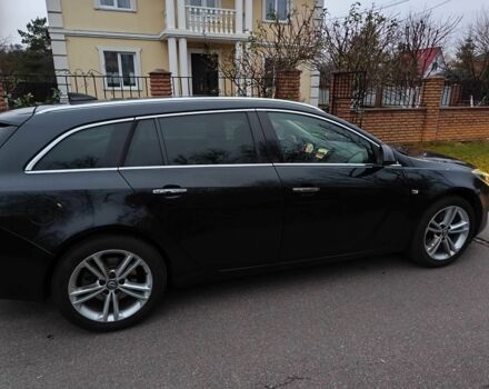Чорний Опель Інсігнія, об'ємом двигуна 2 л та пробігом 255 тис. км за 10999 $, фото 8 на Automoto.ua