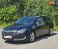 Чорний Опель Інсігнія, об'ємом двигуна 1.96 л та пробігом 238 тис. км за 10499 $, фото 9 на Automoto.ua