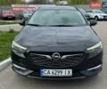 Черный Опель Инсигния, объемом двигателя 1.6 л и пробегом 211 тыс. км за 11400 $, фото 1 на Automoto.ua