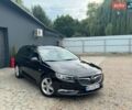 Черный Опель Инсигния, объемом двигателя 1.96 л и пробегом 210 тыс. км за 13990 $, фото 8 на Automoto.ua