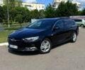 Чорний Опель Інсігнія, об'ємом двигуна 1.6 л та пробігом 211 тис. км за 11400 $, фото 1 на Automoto.ua