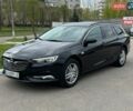Черный Опель Инсигния, объемом двигателя 1.6 л и пробегом 211 тыс. км за 11400 $, фото 1 на Automoto.ua