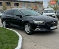 Черный Опель Инсигния, объемом двигателя 1.6 л и пробегом 211 тыс. км за 11400 $, фото 2 на Automoto.ua