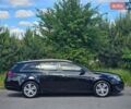 Чорний Опель Інсігнія, об'ємом двигуна 1.96 л та пробігом 238 тис. км за 10499 $, фото 4 на Automoto.ua