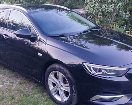 Черный Опель Инсигния, объемом двигателя 1.96 л и пробегом 199 тыс. км за 14300 $, фото 2 на Automoto.ua