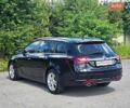 Чорний Опель Інсігнія, об'ємом двигуна 1.96 л та пробігом 238 тис. км за 10499 $, фото 7 на Automoto.ua