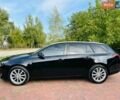 Черный Опель Инсигния, объемом двигателя 1.6 л и пробегом 68 тыс. км за 12200 $, фото 1 на Automoto.ua