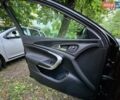Чорний Опель Інсігнія, об'ємом двигуна 1.6 л та пробігом 230 тис. км за 11700 $, фото 9 на Automoto.ua