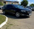 Чорний Опель Інсігнія, об'ємом двигуна 1.6 л та пробігом 211 тис. км за 11400 $, фото 2 на Automoto.ua