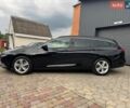 Черный Опель Инсигния, объемом двигателя 1.96 л и пробегом 210 тыс. км за 13500 $, фото 1 на Automoto.ua
