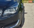 Чорний Опель Інсігнія, об'ємом двигуна 1.96 л та пробігом 238 тис. км за 10499 $, фото 14 на Automoto.ua