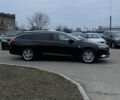 Чорний Опель Інсігнія, об'ємом двигуна 1.6 л та пробігом 211 тис. км за 13900 $, фото 3 на Automoto.ua