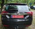 Чорний Опель Інсігнія, об'ємом двигуна 1.6 л та пробігом 230 тис. км за 11700 $, фото 4 на Automoto.ua