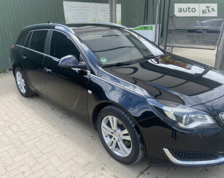 Чорний Опель Інсігнія, об'ємом двигуна 2 л та пробігом 197 тис. км за 10900 $, фото 1 на Automoto.ua