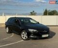Чорний Опель Інсігнія, об'ємом двигуна 1.6 л та пробігом 163 тис. км за 13900 $, фото 1 на Automoto.ua