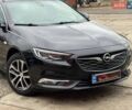 Черный Опель Инсигния, объемом двигателя 1.6 л и пробегом 240 тыс. км за 13600 $, фото 2 на Automoto.ua