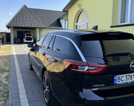 Чорний Опель Інсігнія, об'ємом двигуна 1.96 л та пробігом 240 тис. км за 13999 $, фото 3 на Automoto.ua