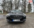 Черный Опель Инсигния, объемом двигателя 2 л и пробегом 240 тыс. км за 18900 $, фото 2 на Automoto.ua