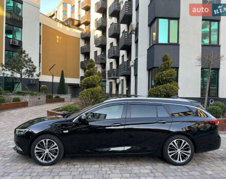 Черный Опель Инсигния, объемом двигателя 1.96 л и пробегом 241 тыс. км за 15900 $, фото 4 на Automoto.ua