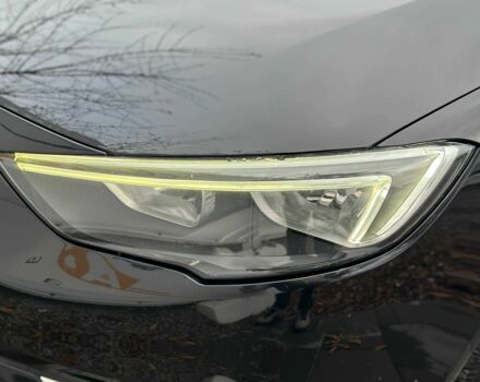 Черный Опель Инсигния, объемом двигателя 2 л и пробегом 324 тыс. км за 13900 $, фото 4 на Automoto.ua