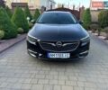 Черный Опель Инсигния, объемом двигателя 1.96 л и пробегом 211 тыс. км за 13999 $, фото 1 на Automoto.ua