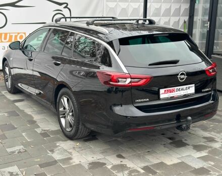 Черный Опель Инсигния, объемом двигателя 2 л и пробегом 324 тыс. км за 13900 $, фото 7 на Automoto.ua