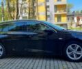 Чорний Опель Інсігнія, об'ємом двигуна 2 л та пробігом 227 тис. км за 15999 $, фото 4 на Automoto.ua