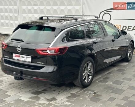 Черный Опель Инсигния, объемом двигателя 1.96 л и пробегом 324 тыс. км за 13900 $, фото 10 на Automoto.ua