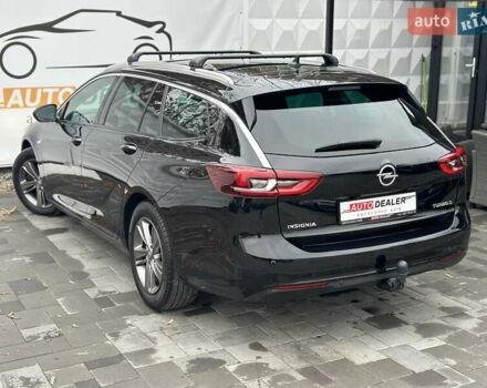 Черный Опель Инсигния, объемом двигателя 1.96 л и пробегом 324 тыс. км за 13900 $, фото 1 на Automoto.ua